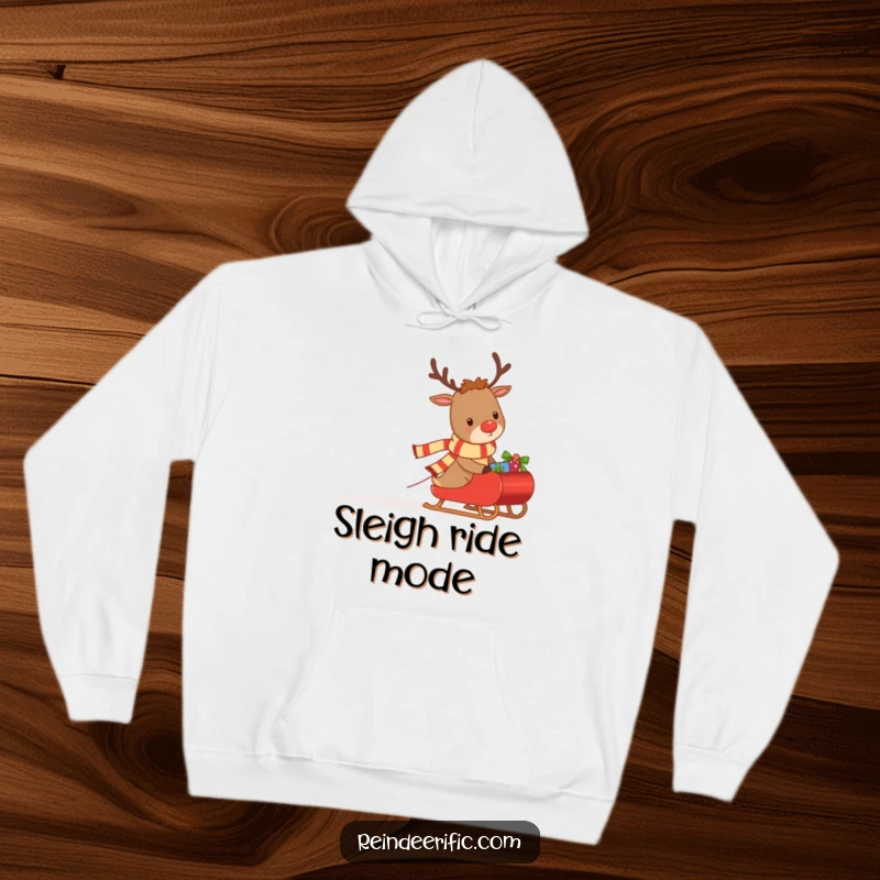 Funny hoodie with a dedicated reindeer character sporting a small scarf, pulling a sleigh heavily laden with gifts.